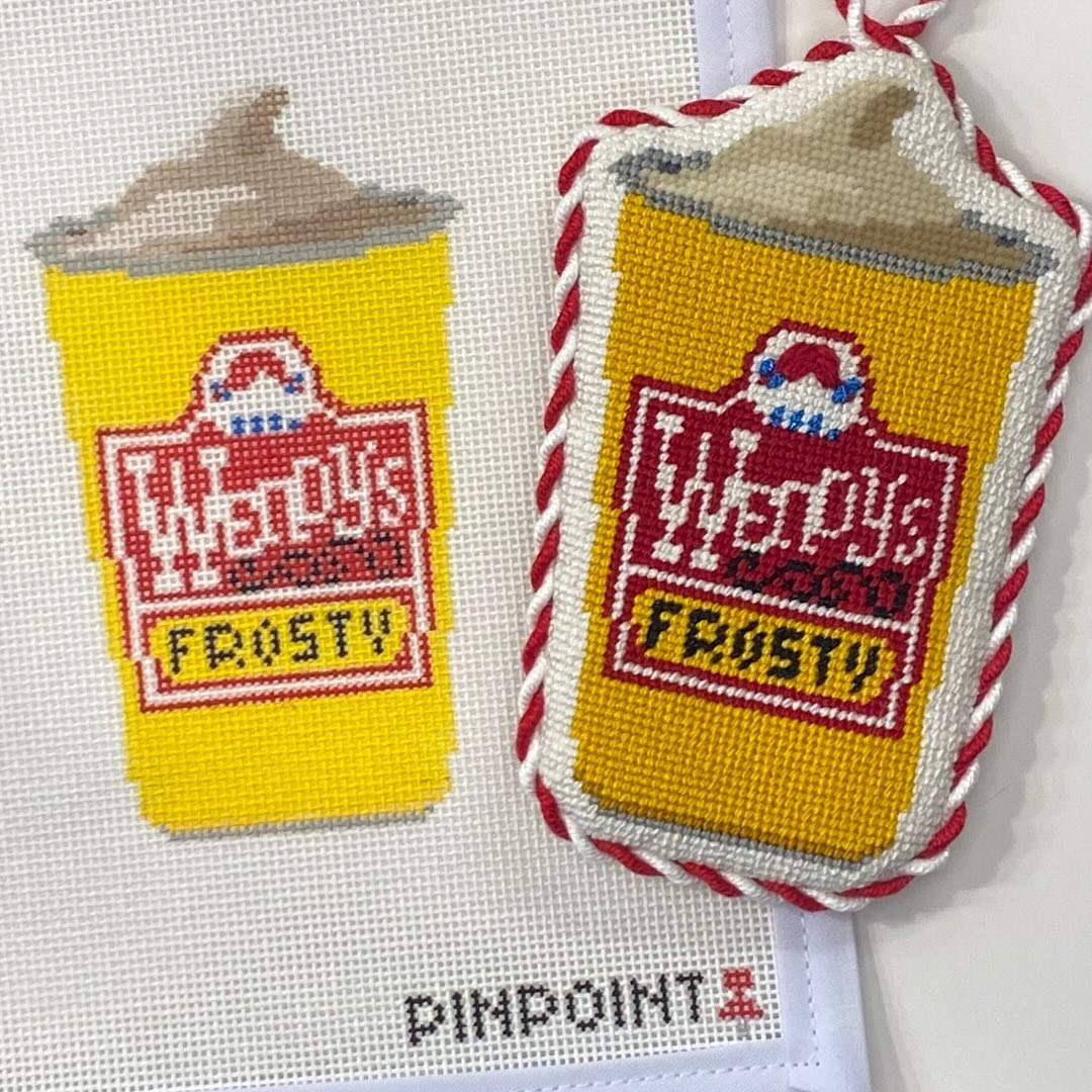 Frosty needlepoint canvas beside its finished stitched version from @pinpointneedlepoint on Instagram